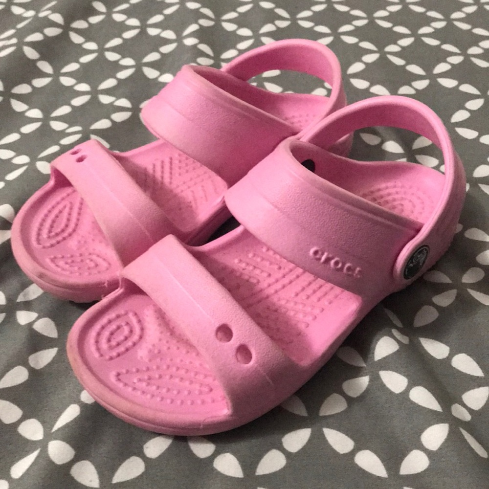 Pink Crocs sandals